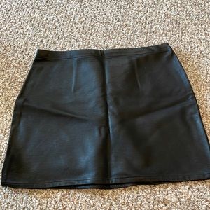 Black leather mini skirt